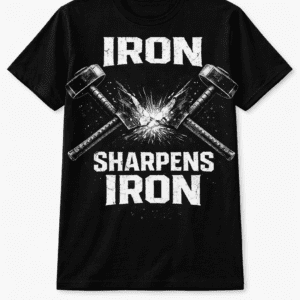 Black t-shirt on a white background featuring a bold “Iron Sharpens Iron” design with crossed sledgehammers and a distressed white graphic.
